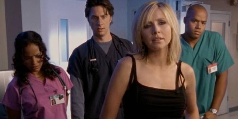 10 Original Scrubs Episodes That Have Aged Poorly 1 JD, Carla and Turk stand around Elliot in Scrubs