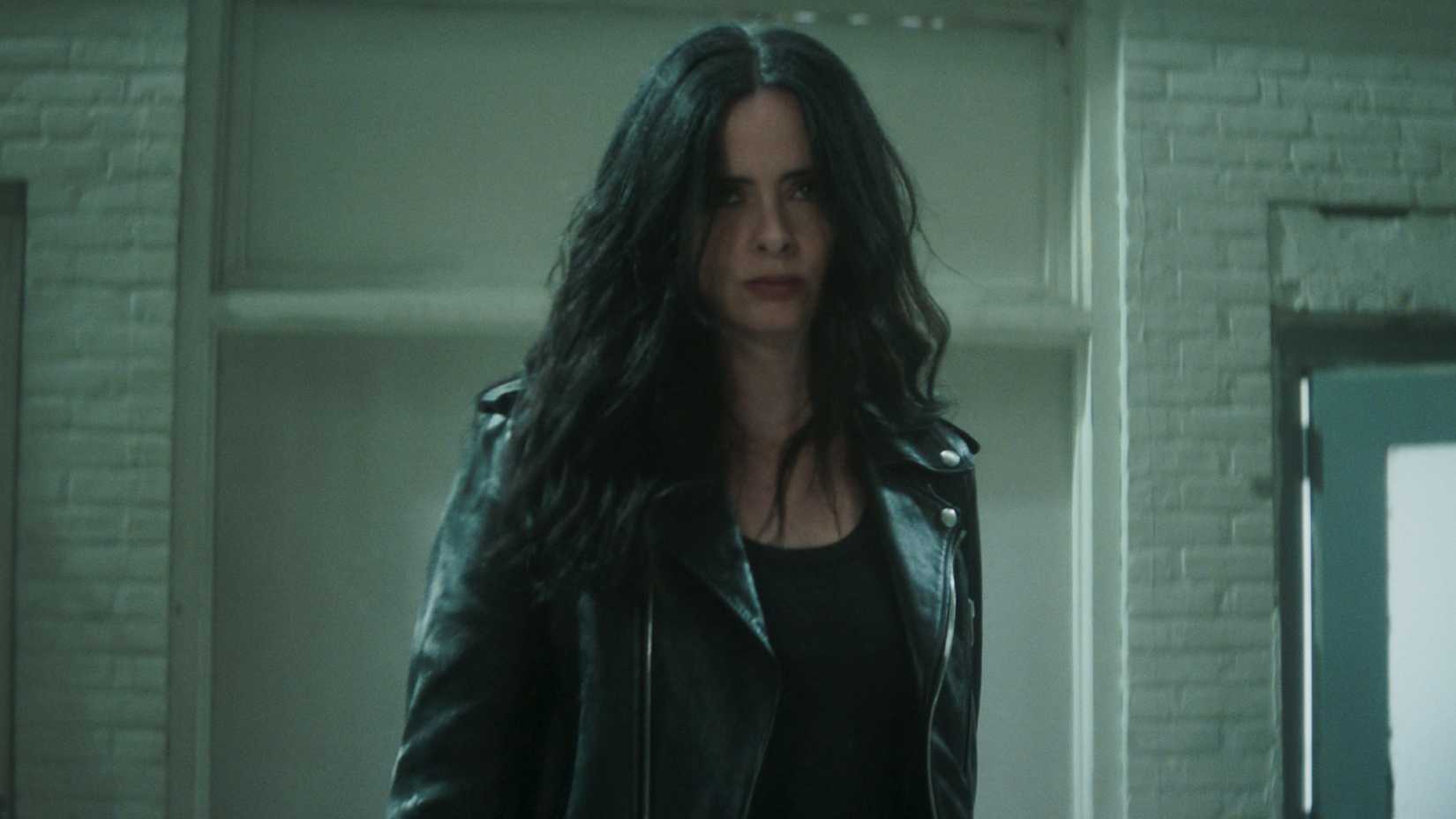 jessica jones standing in a hallway in daredevil born again season 2