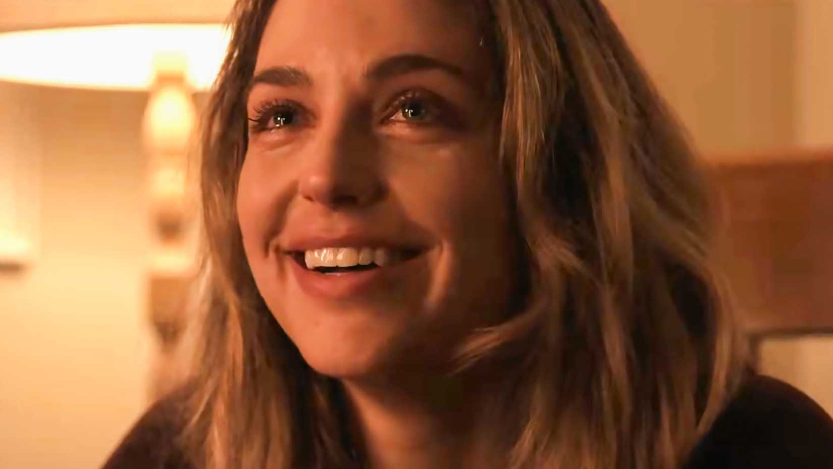 Jessica Rothe's New Horror Movie Required A Seance After Filming In A House That's "150% Haunted" 1 Jessica Rothe's Marie smiling with tears in her eyes in Imposters