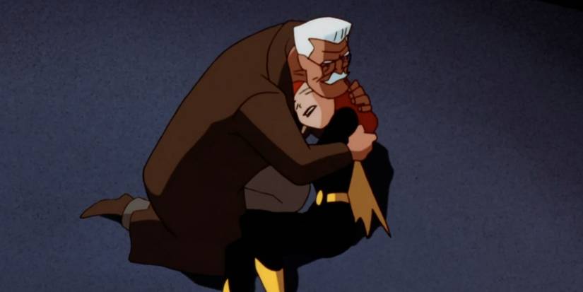 Jim Gordon segurando Barbara Gordon após um acidente em Batman: The Animated Series