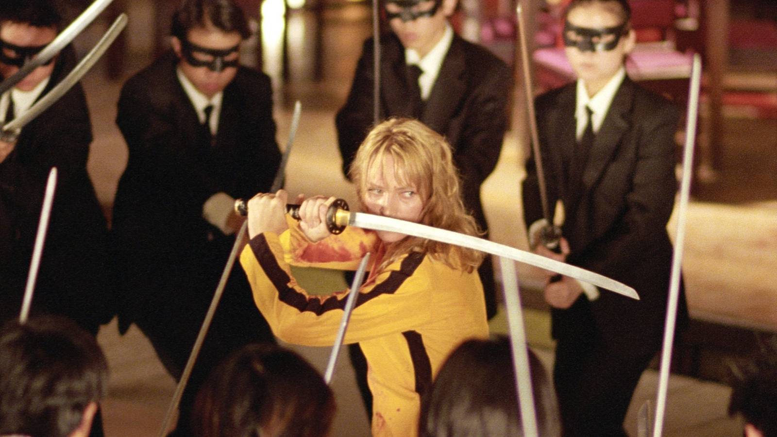 The Bride surrounded by the Crazy 88 wielding swords in Kill Bill