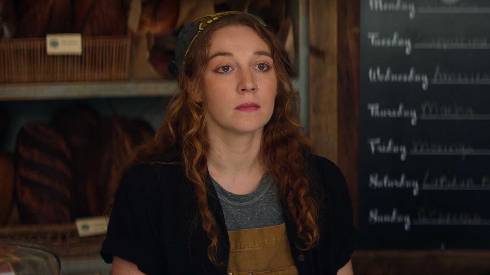 10 Biggest Changes Netflix’s Vladimir Makes To Julia May Jonas’ Book 2 Lila stands in the bakery in Vladimir episode 1