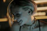 Greta grinning in the Aquila Rift episode of Love, Death & Robots