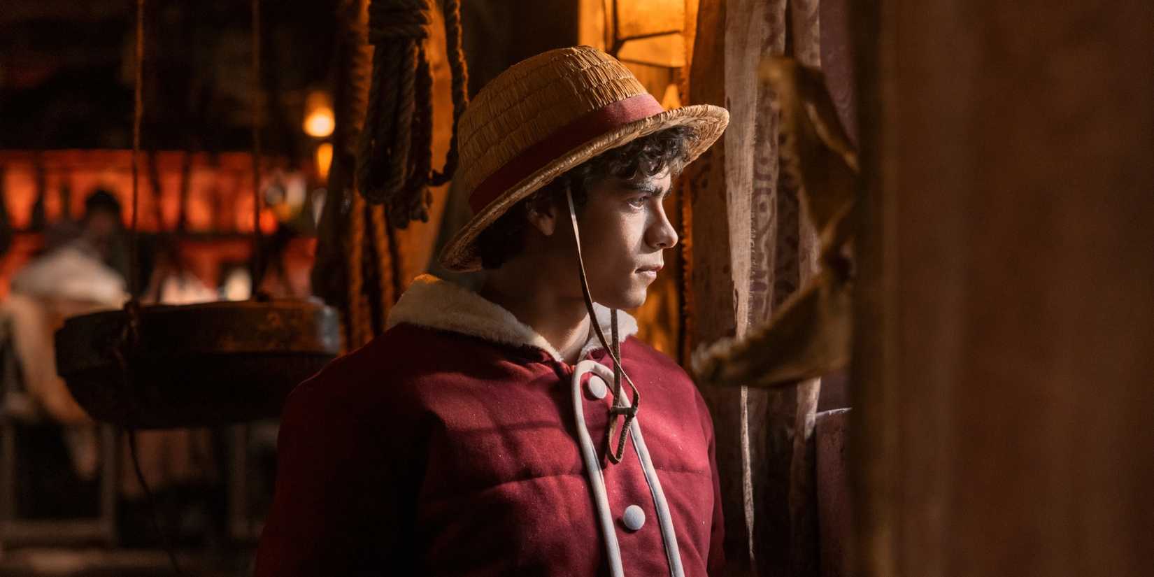 Luffy looking whistfully out a window in One Piece season 2