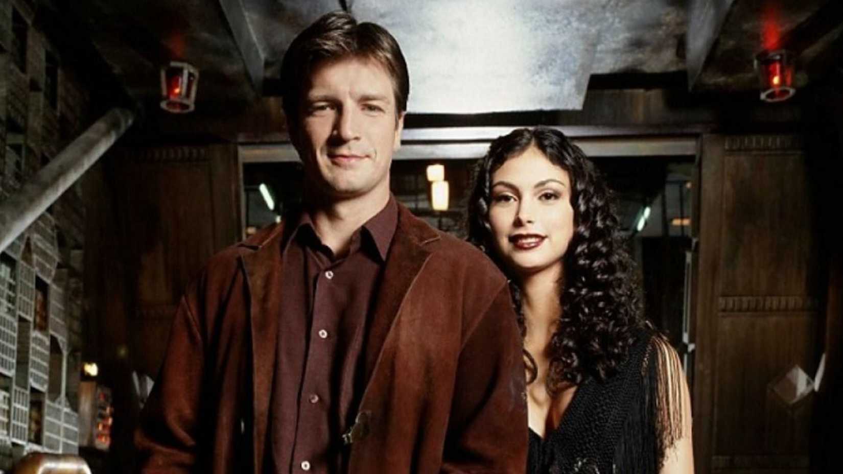 7 Unanswered Questions From Serenity A Firefly Revival Would Need To Finally Answer 5 Mal (Nathan Fillian) and Inara (Morena Baccarin) posing together on ship in Firefly