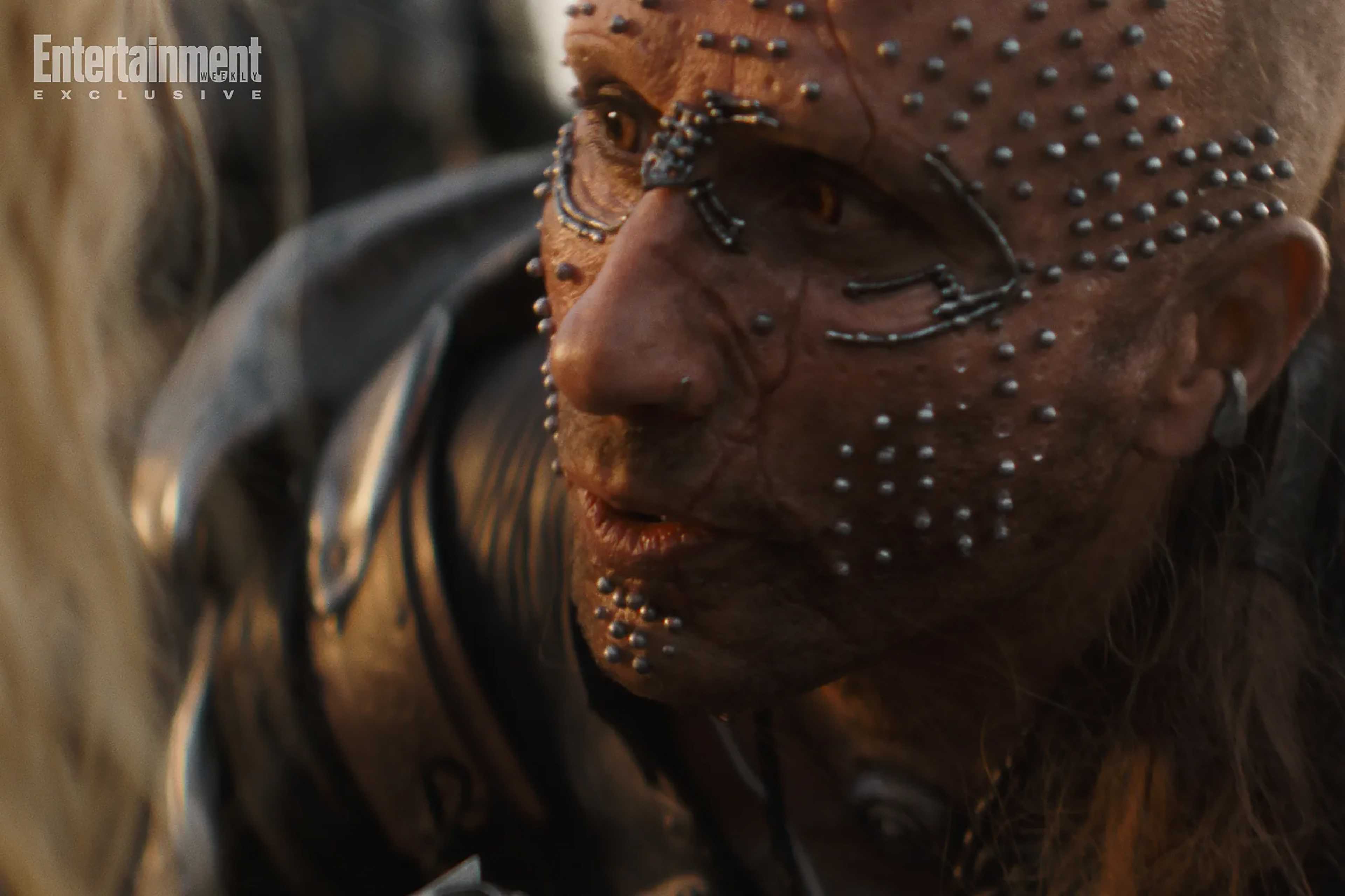 Matthias Schoenaerts as Krem of the Yellow Hills standing closely in someone's face in Supergirl