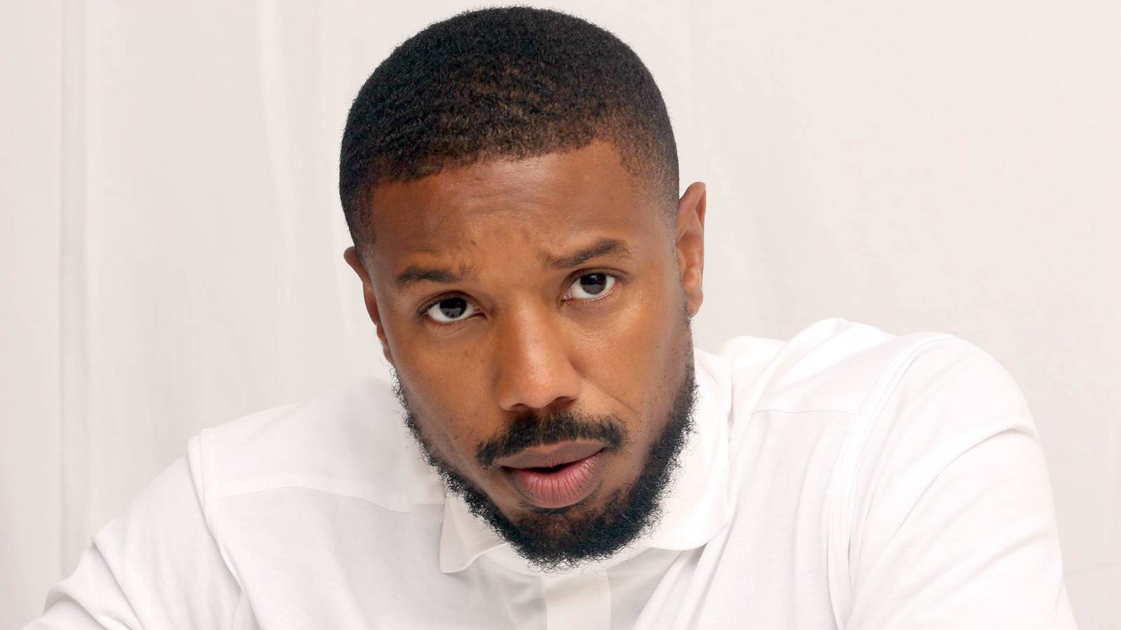 Michael B. Jordan Grins Over Casting Rumors For Reboot Of Iconic 42-Year-Old Crime Series