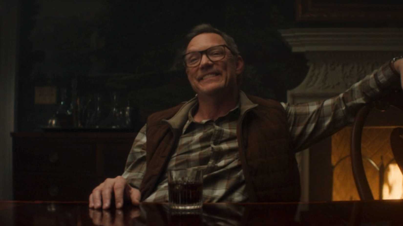 Matthew Lillard as Mr. Charles smiles in Daredevil: Born Again Season 2 Episode 1