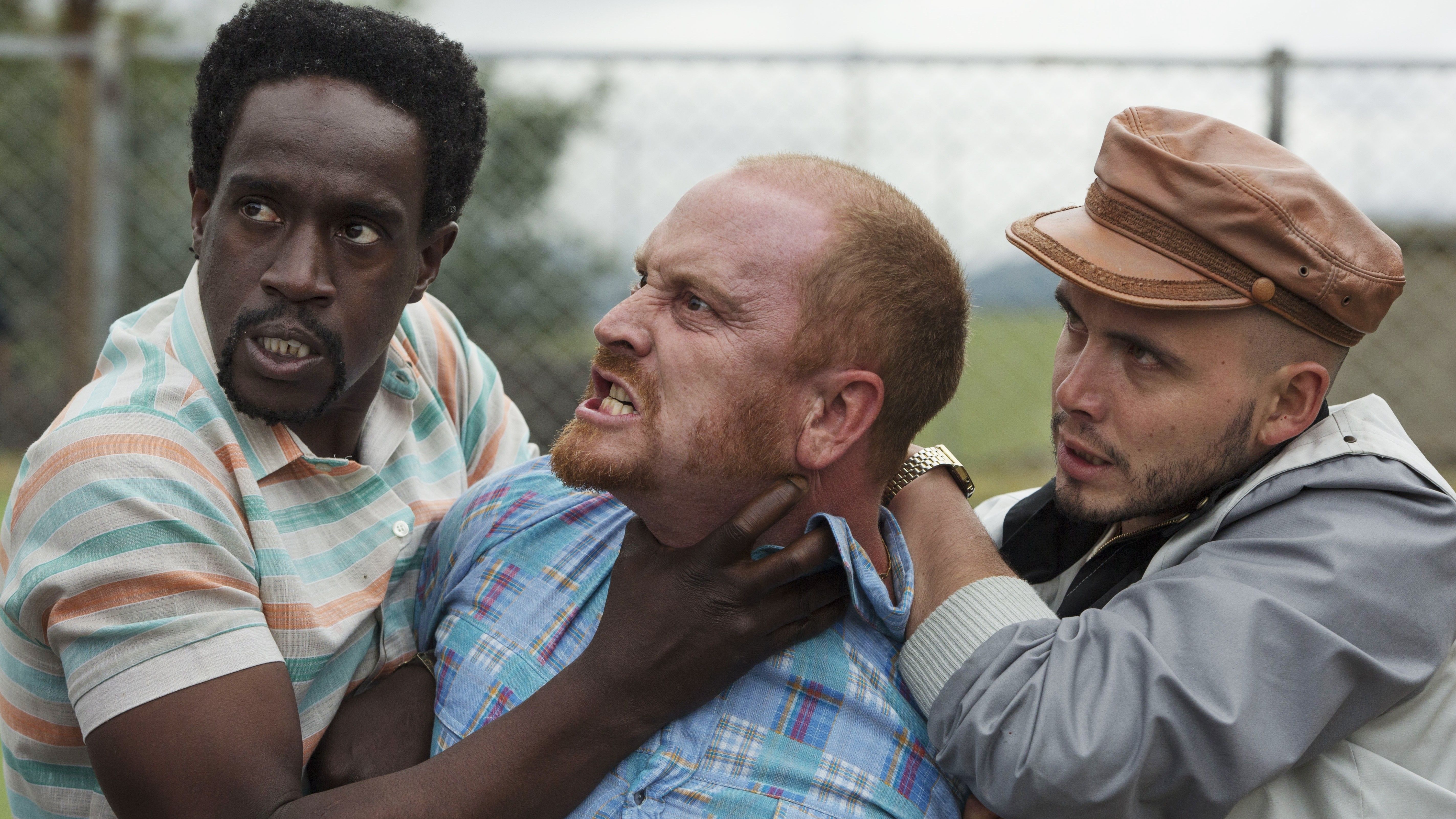 Julian Diaz and Alejandro Buitrago holding Christian Tappán in Narcos (2015)