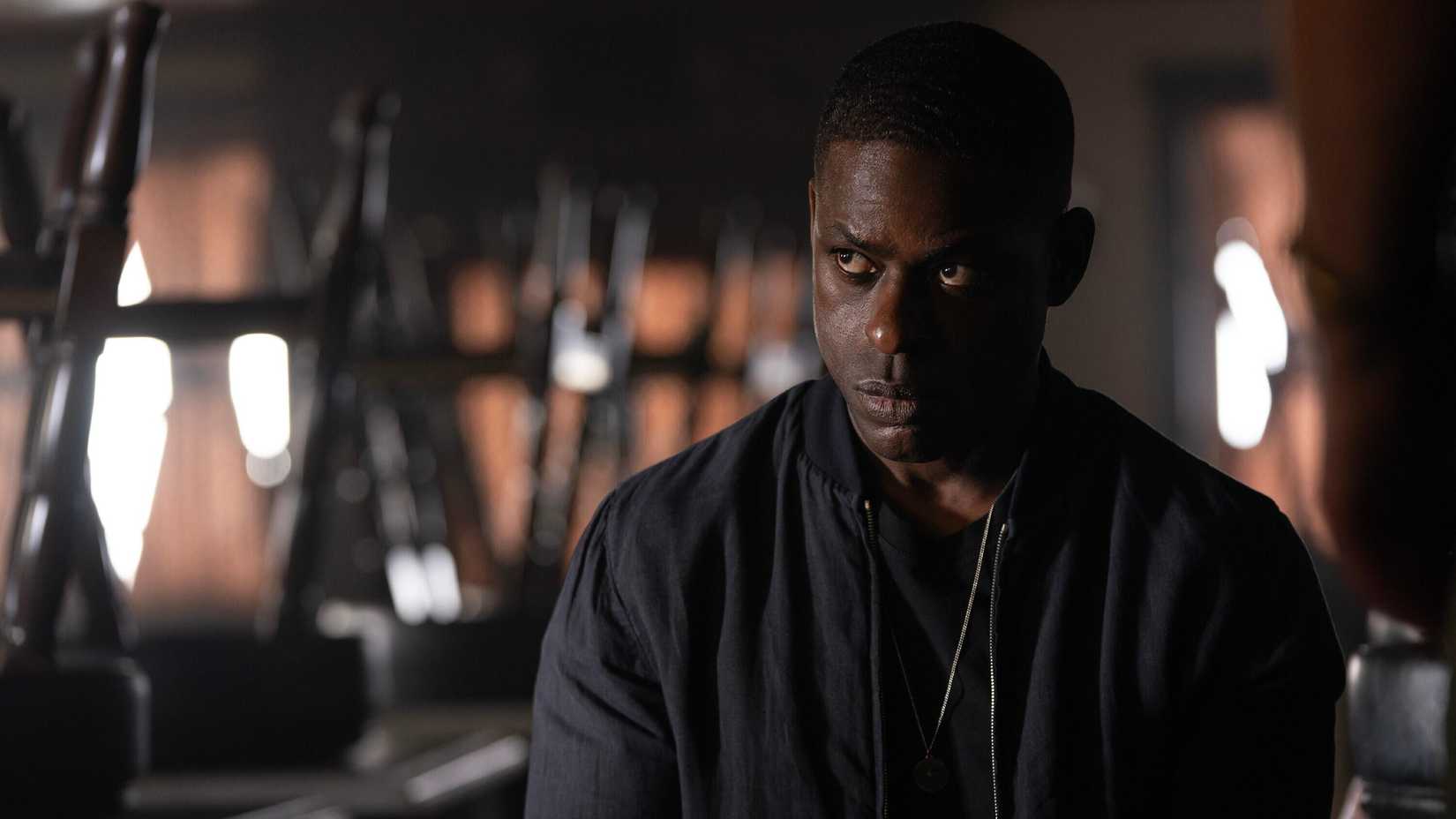 Paradise still featuring Sterling K Brown wearing a black jacket with a bruise beneath his eye.