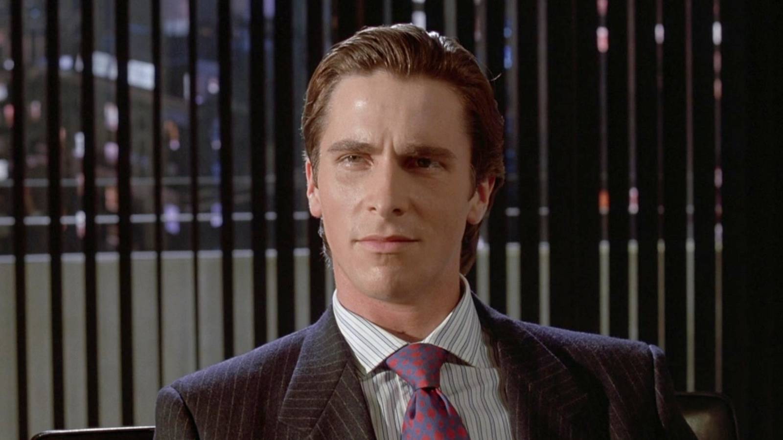 Patrick Bateman on the couch in American Psycho