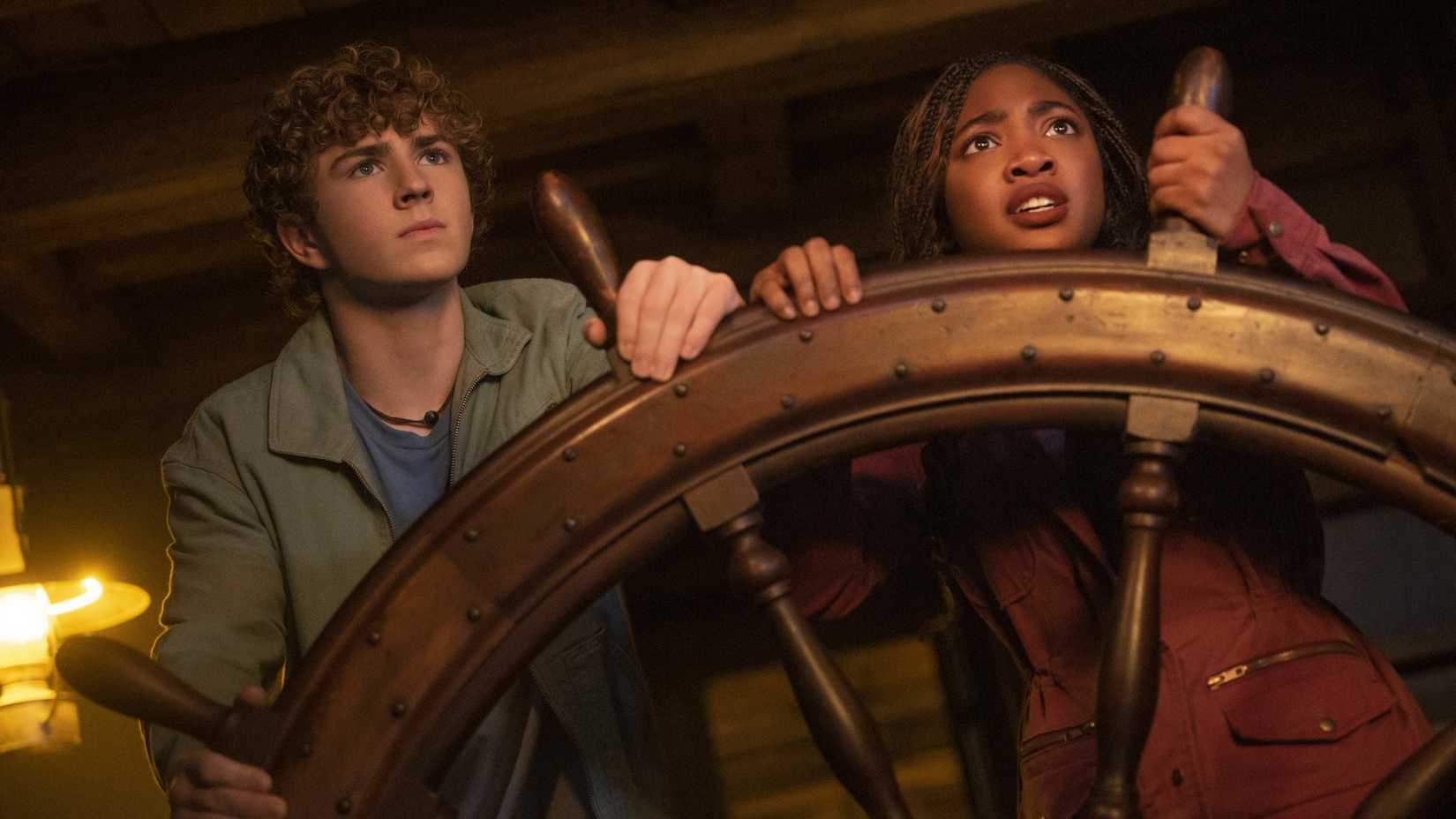 Percy and Annabeth at the wheel of a ship in Percy Jackson and the Olympians season 2