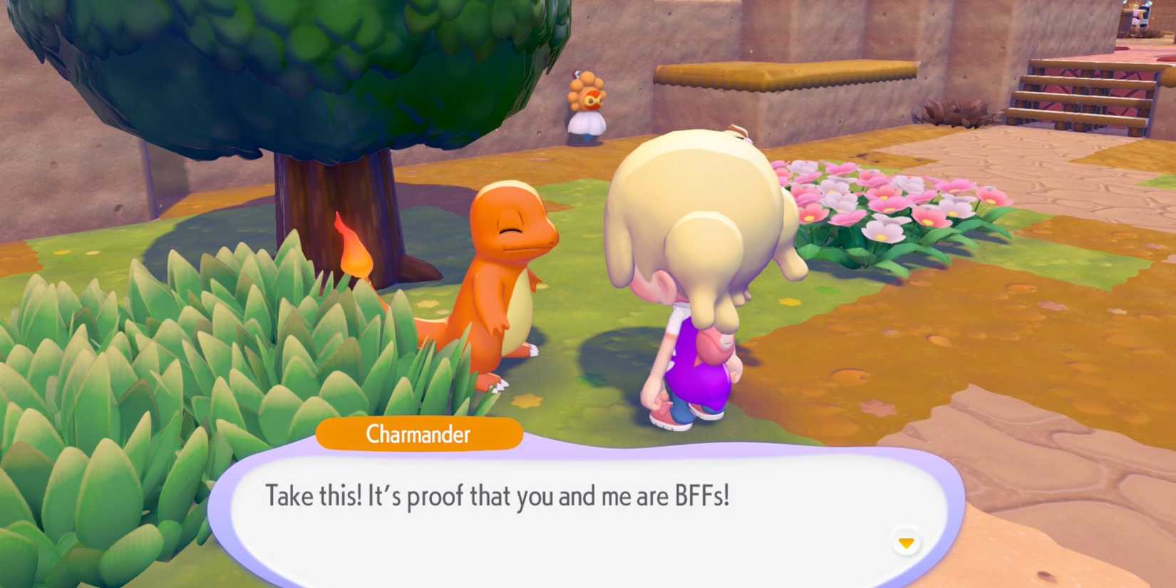 Pokemon Pokopia player getting a gift from Charmander