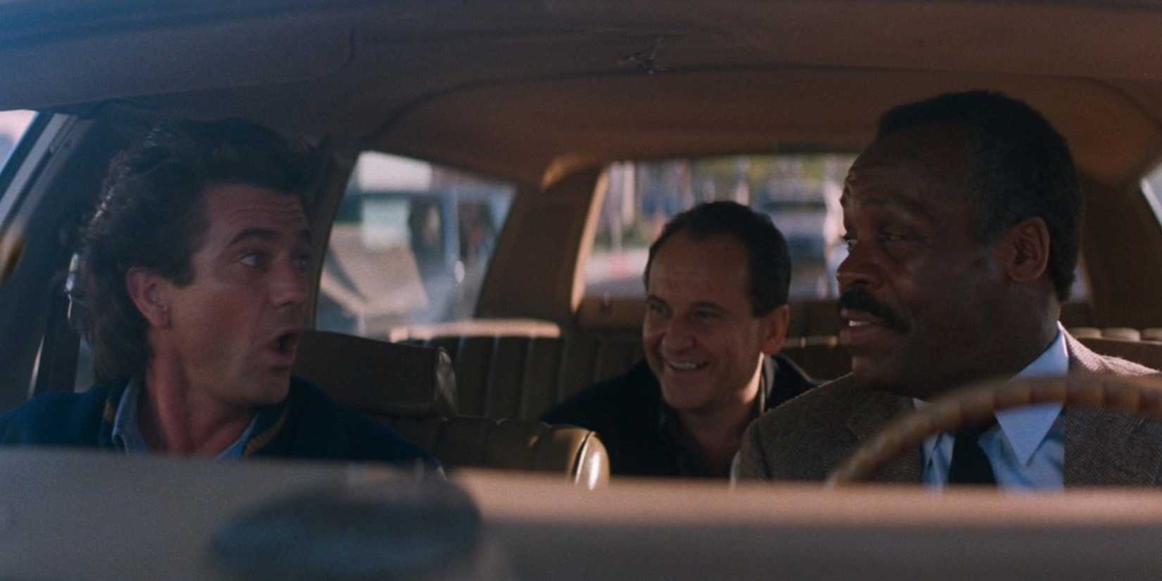 How This Sequel Surpassed The Original Action Classic 1 Riggs and Murtaugh with Leo in the car in Lethal Weapon 2