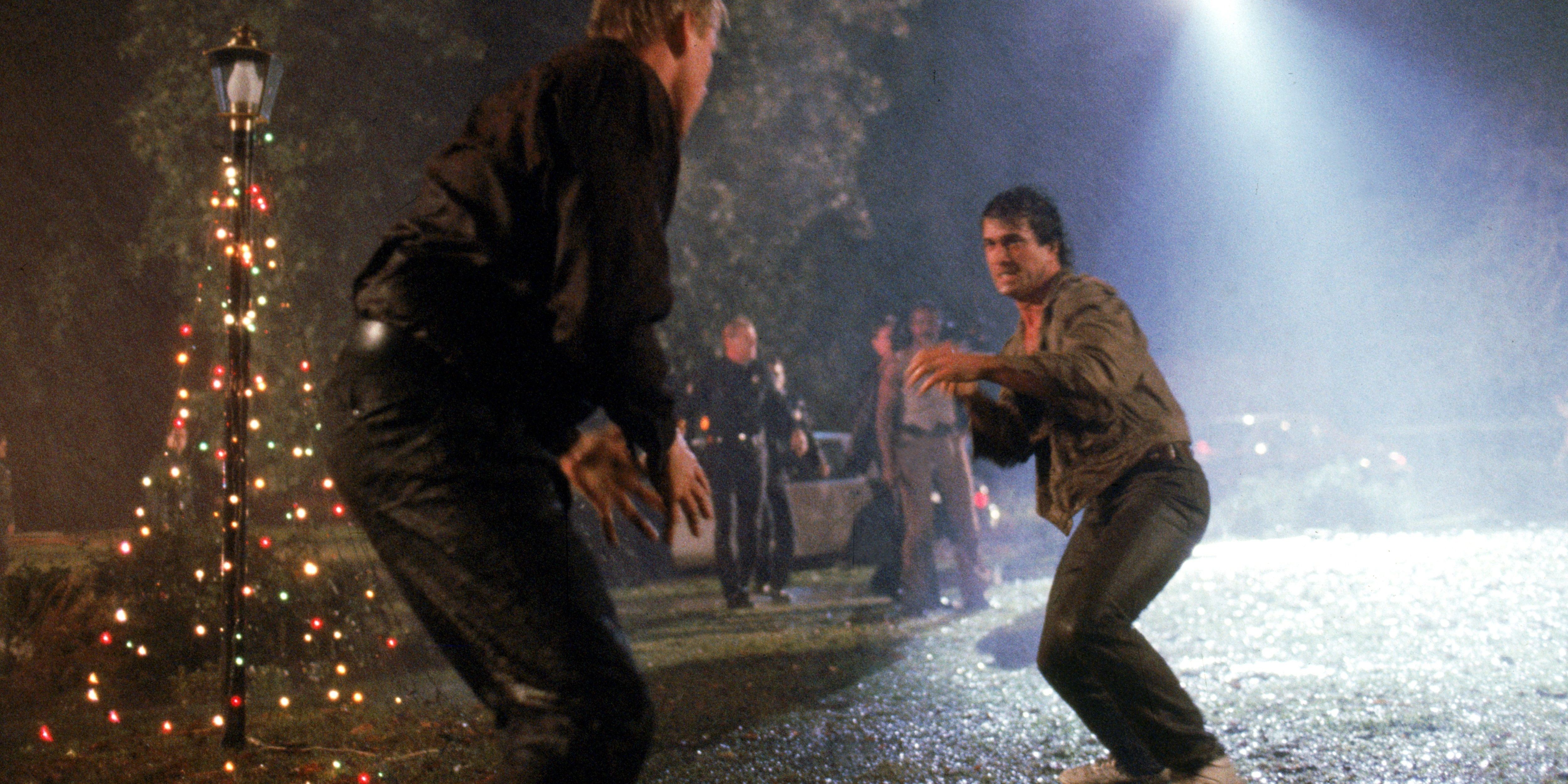 Riggs fights Mr Joshua on the lawn in Lethal Weapon