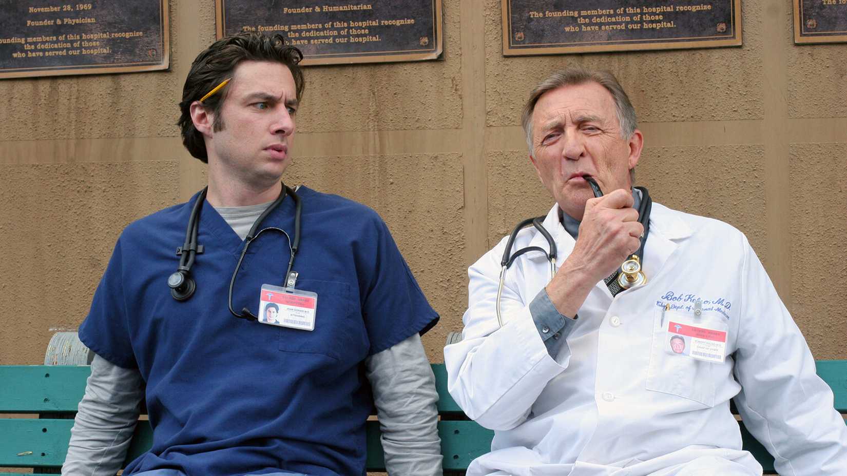JD and Kelso sitting on a bench in Scrubs