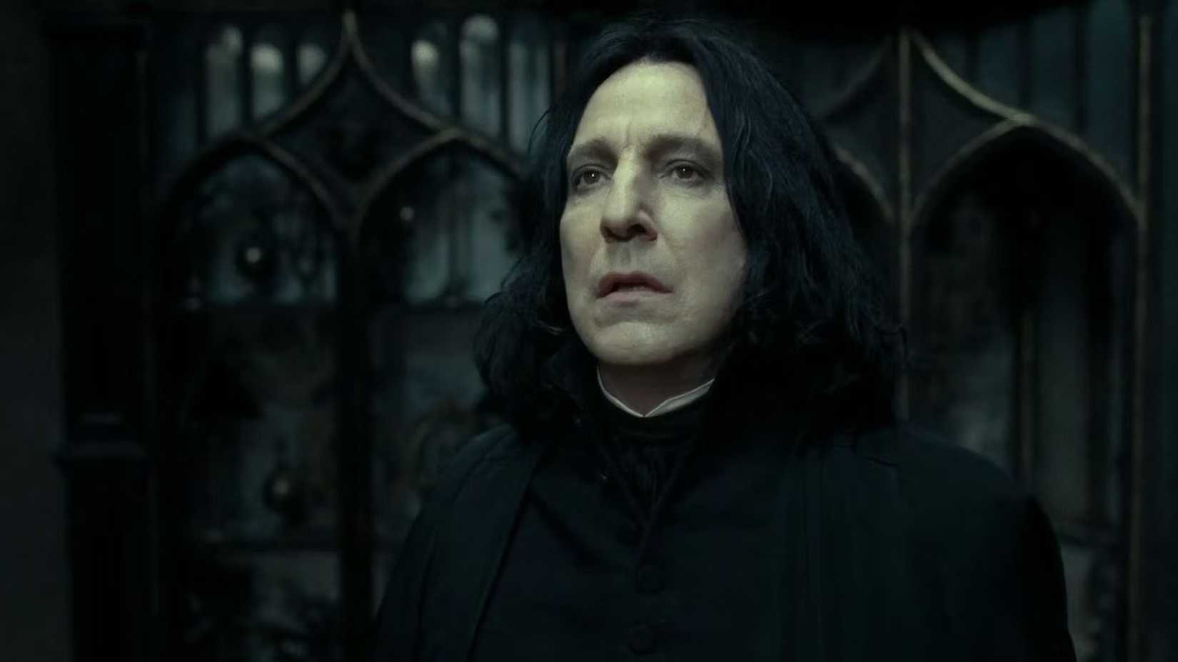 10 Ways Rewatching All 8 Harry Potter Movies In Order Changes How You Look At The Films 8 Severus Snape (Alan Rickman) staring into the distance in Harry Potter and the Deathly Hallows