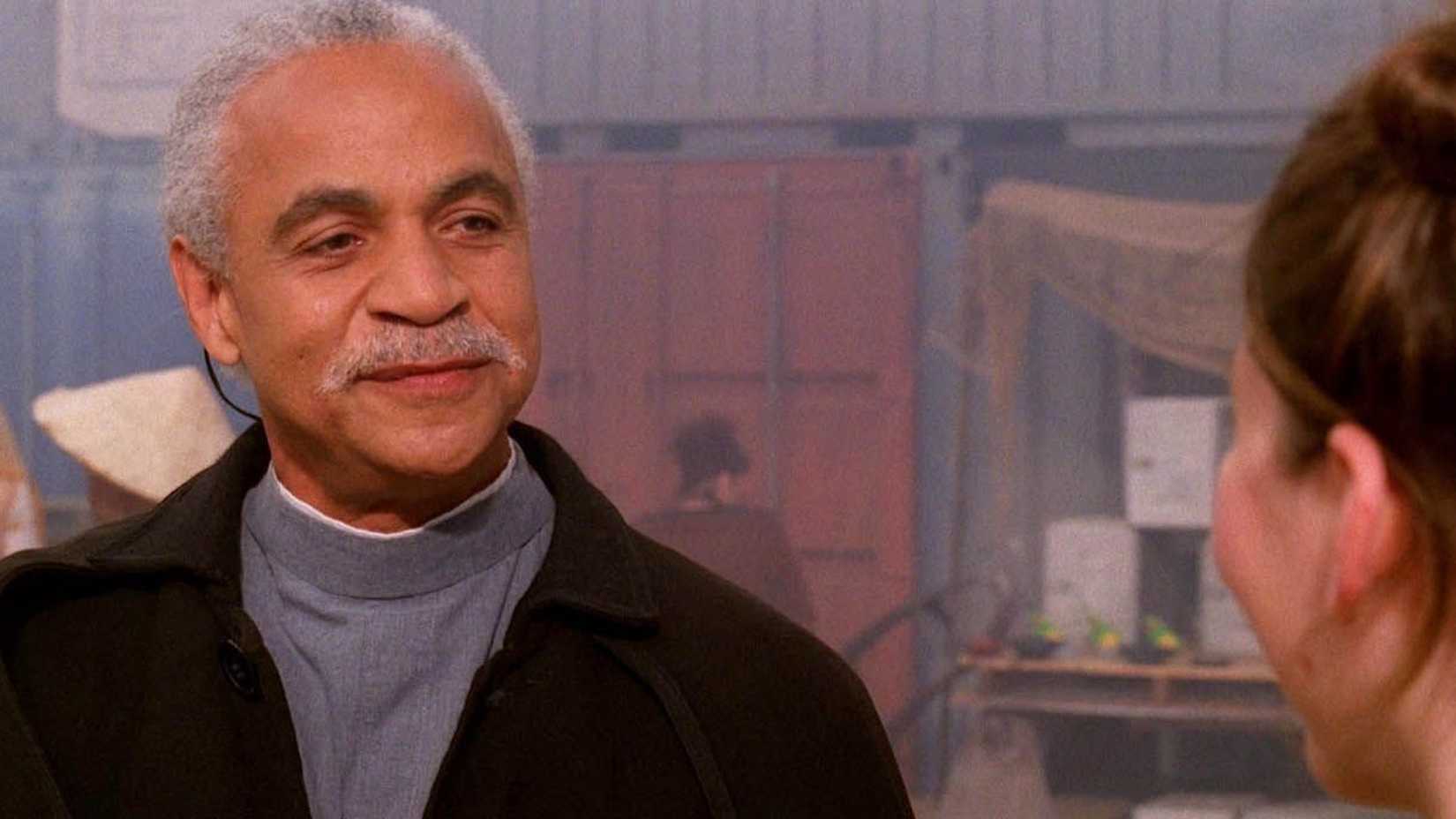 7 Unanswered Questions From Serenity A Firefly Revival Would Need To Finally Answer 3 Shepherd Book talking to Kaylee Frye planetside in Firefly