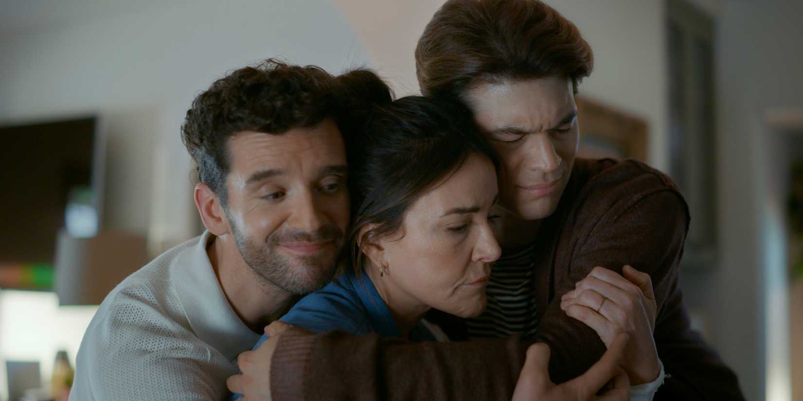 Brian and Charlie hugging Liz in Shrinking season 3