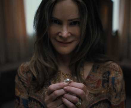 Netflix's New #1 Show Switches Genre After One Episode, And Fans Are Divided 2 Victoria smiles creepily while holding an engagement ring in Something Very Bad Is Going to Happen episode 2