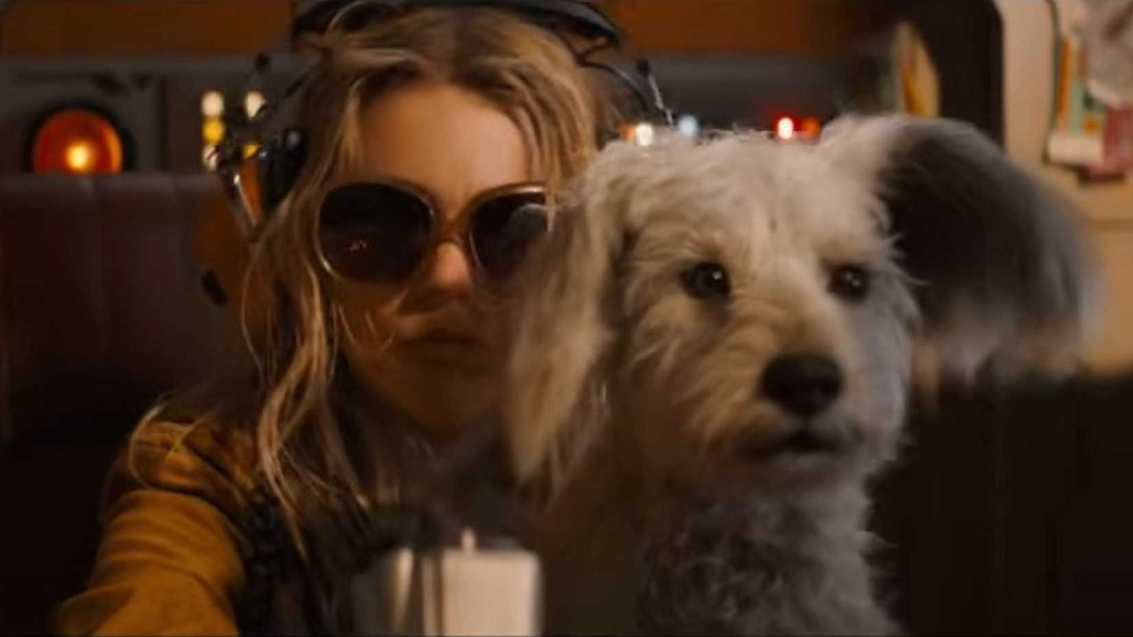 Supergirl and Krypto in a ship