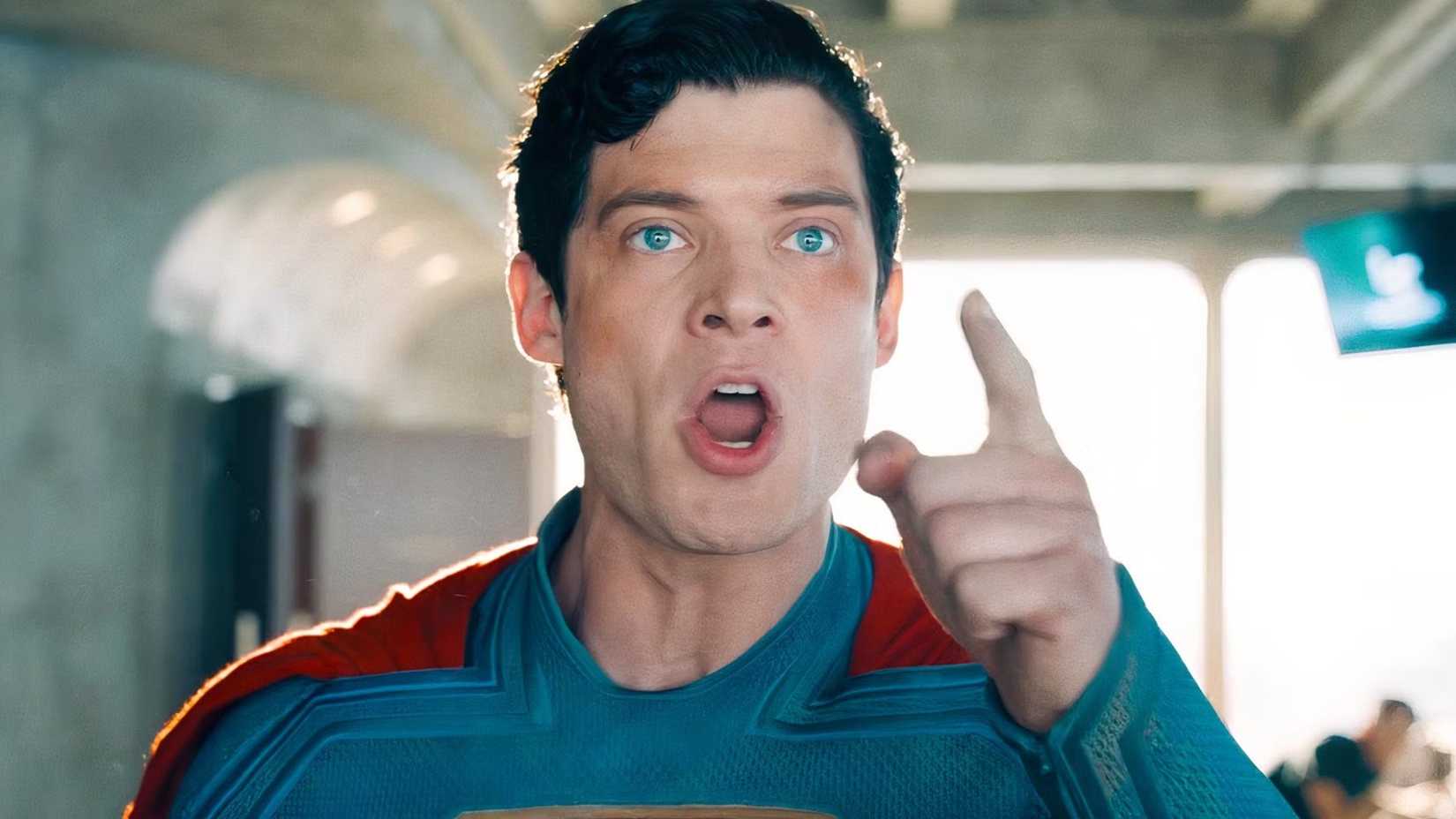 superman is angrily pointing his finger while confronting lex