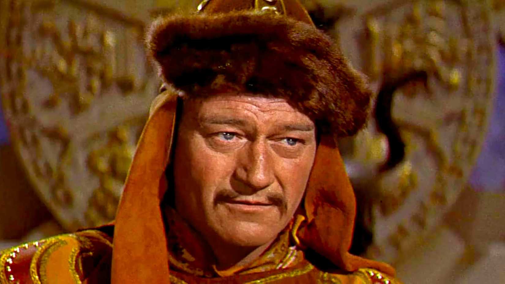 10 Great Actors Who Were Wildly Miscast In Big Movies 7 John Wayne looks on in The Conqueror