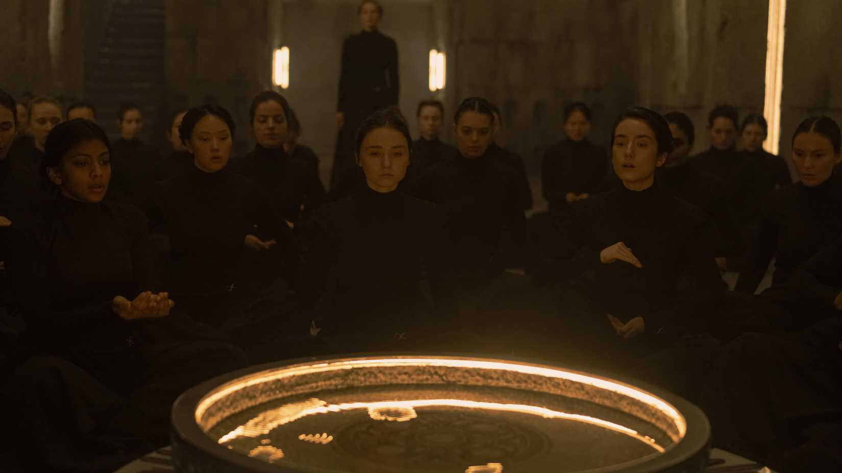 The Sisterhood standing around an orange circle in Dune Prophecy