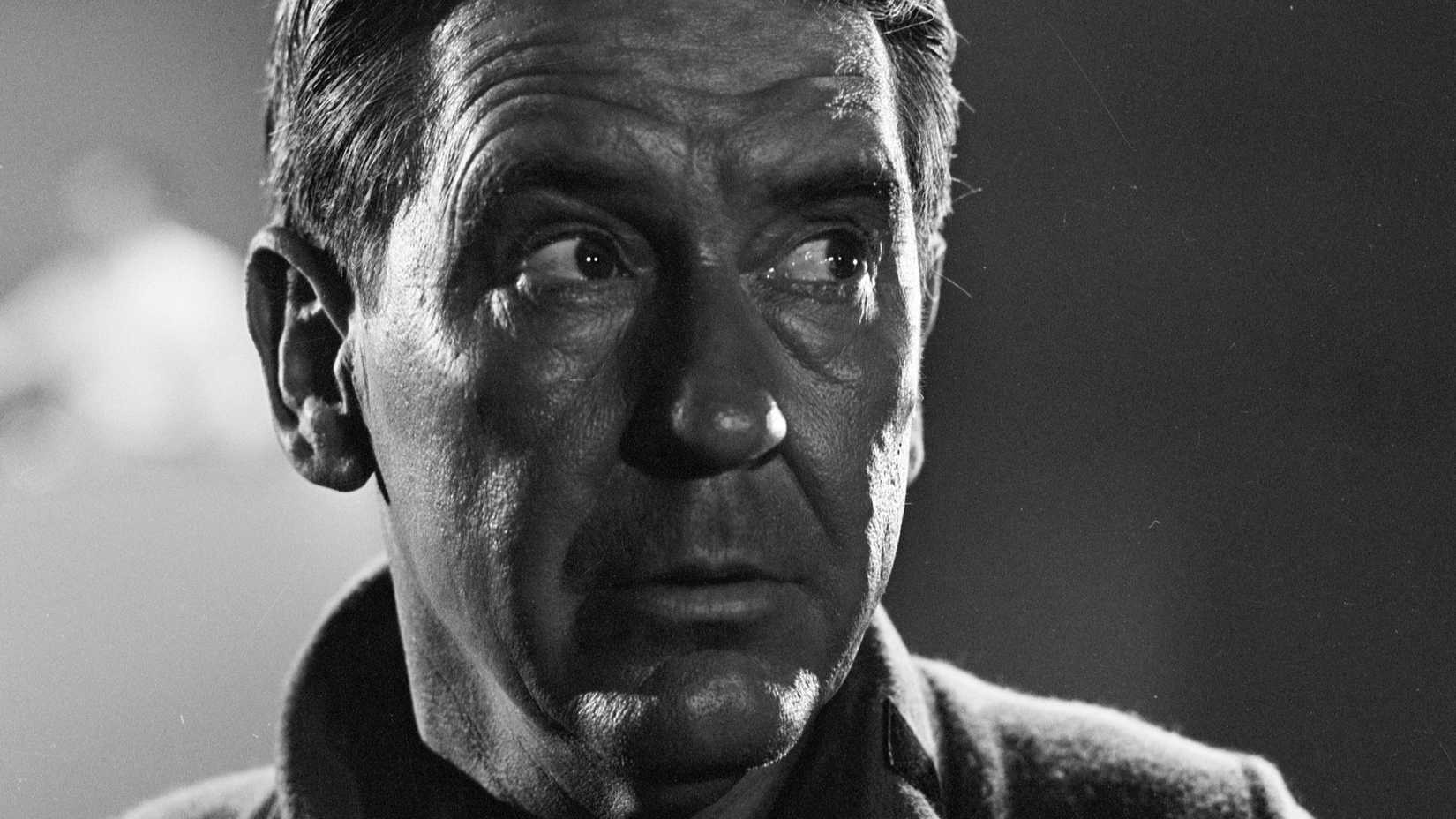 Romney (Burgess Meredith) looking afraid in The Twilight Zone.