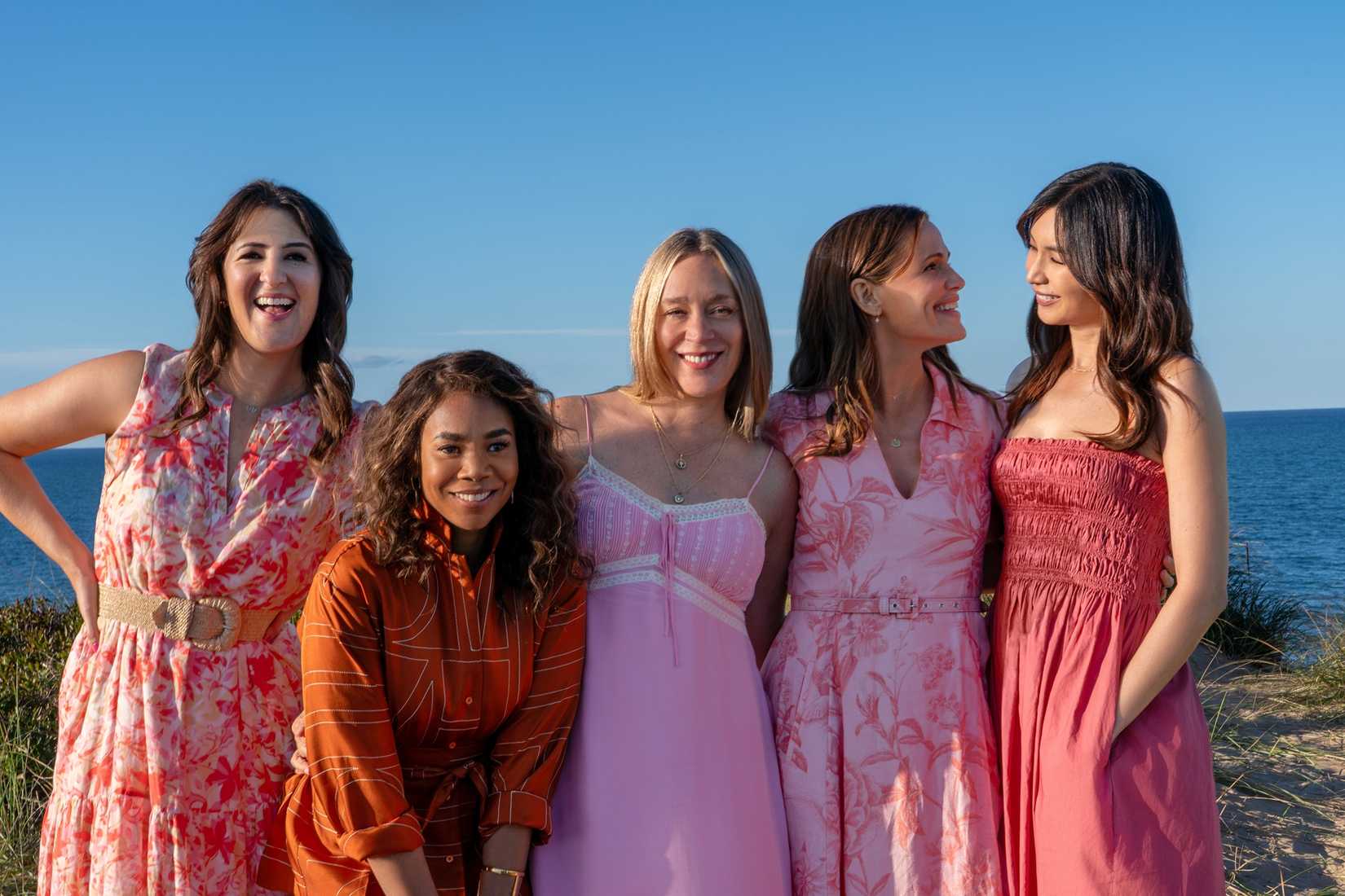 The women posing together in Five-Star Weekend