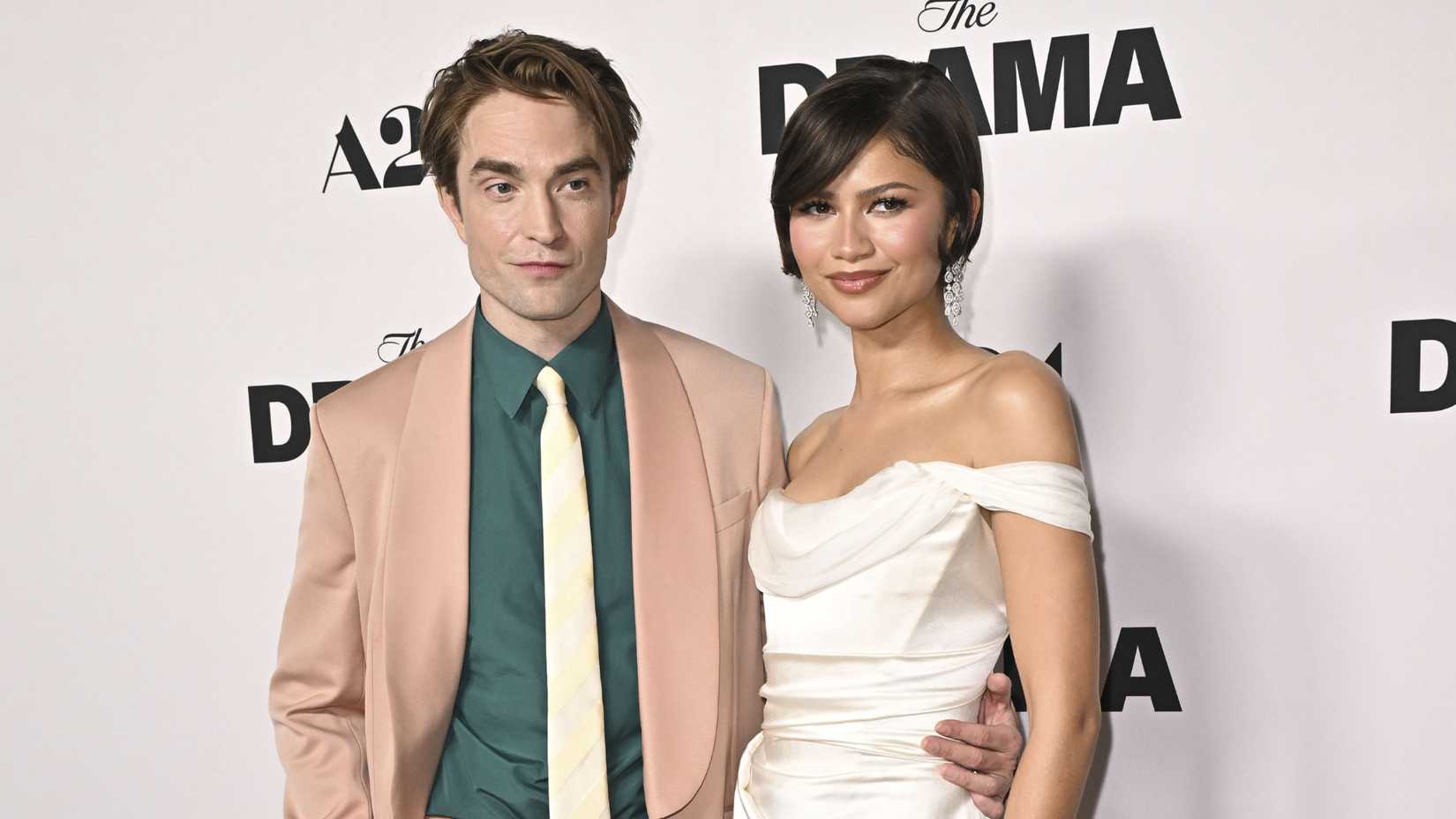Robert Pattinson and Zendaya pose at the Los Angeles Premiere of The Drama