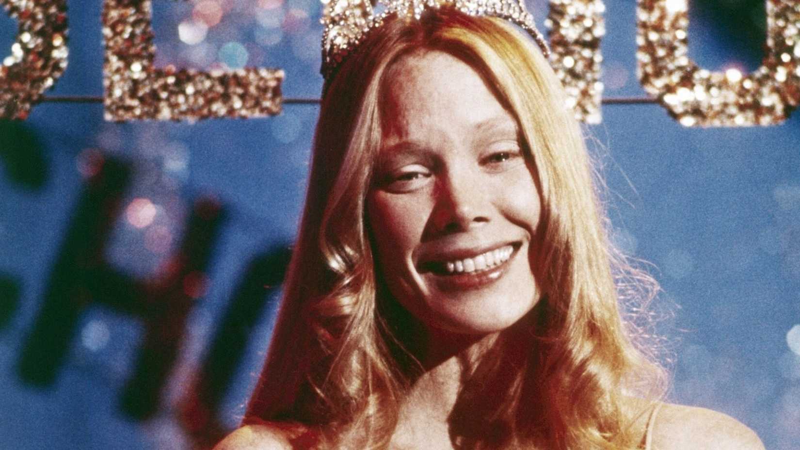 10 Horror Movie Monsters Who Didn't Deserve Their Endings 2 Carrie smiling at the prom