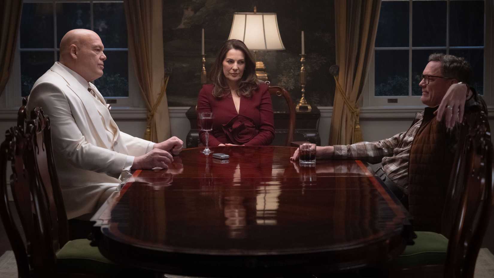Wilson Fisk (Vincent D'Onofrio), Vanessa (Ayelet Zurer) and Mr. Charles (Matthew Lillard) at the table in Daredevil: Born Again Season 2