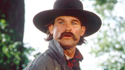 Wyatt (Kurt Russell) with a full rimmed hat on in Tombstone