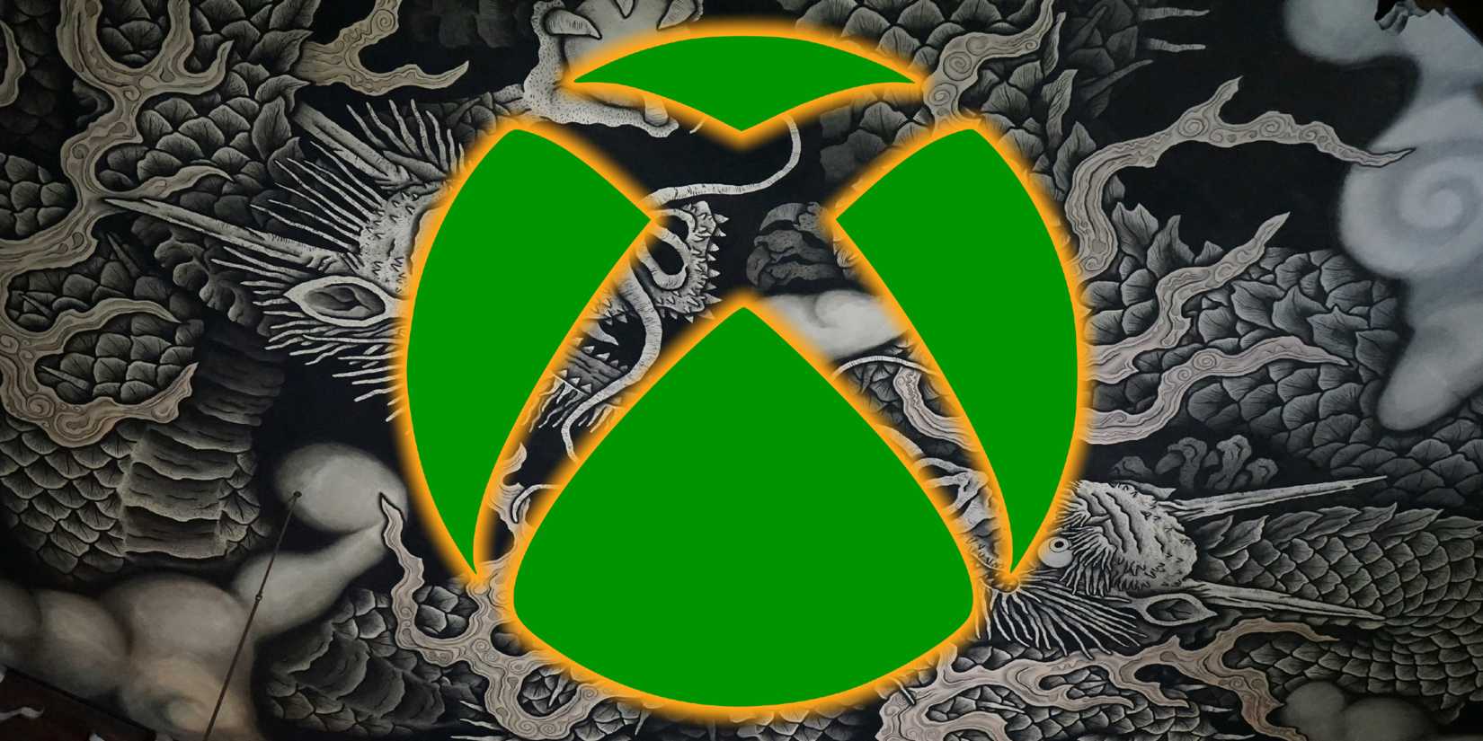 The Xbox logo is superimposed over an image of two dragons.