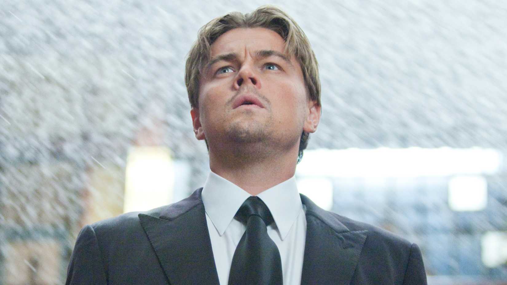 Leonardo DiCaprio’s Cobb looking surprised in Christopher Nolan’s Inception