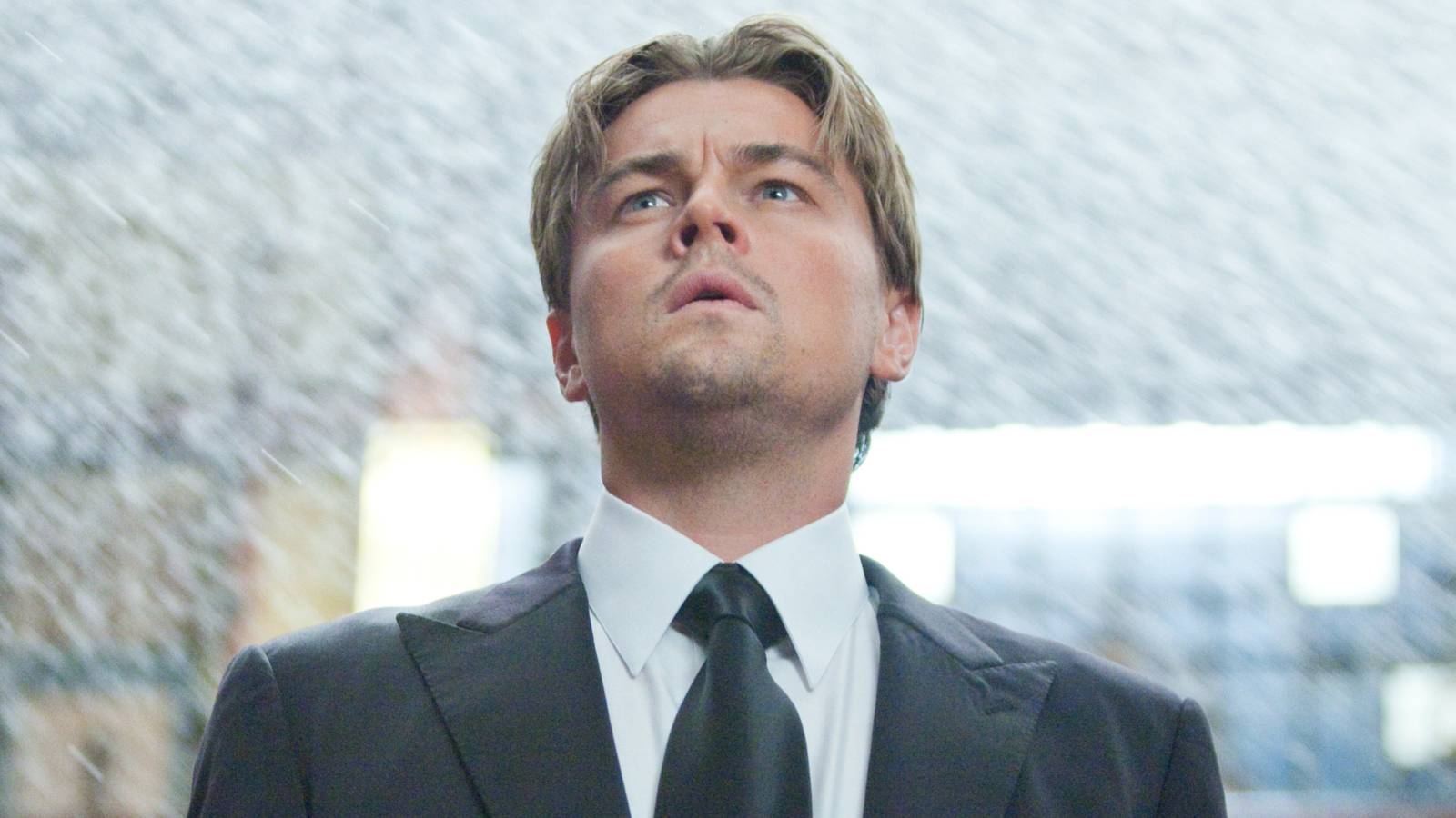 Leonardo DiCaprio’s Cobb looking surprised in Christopher Nolan’s Inception