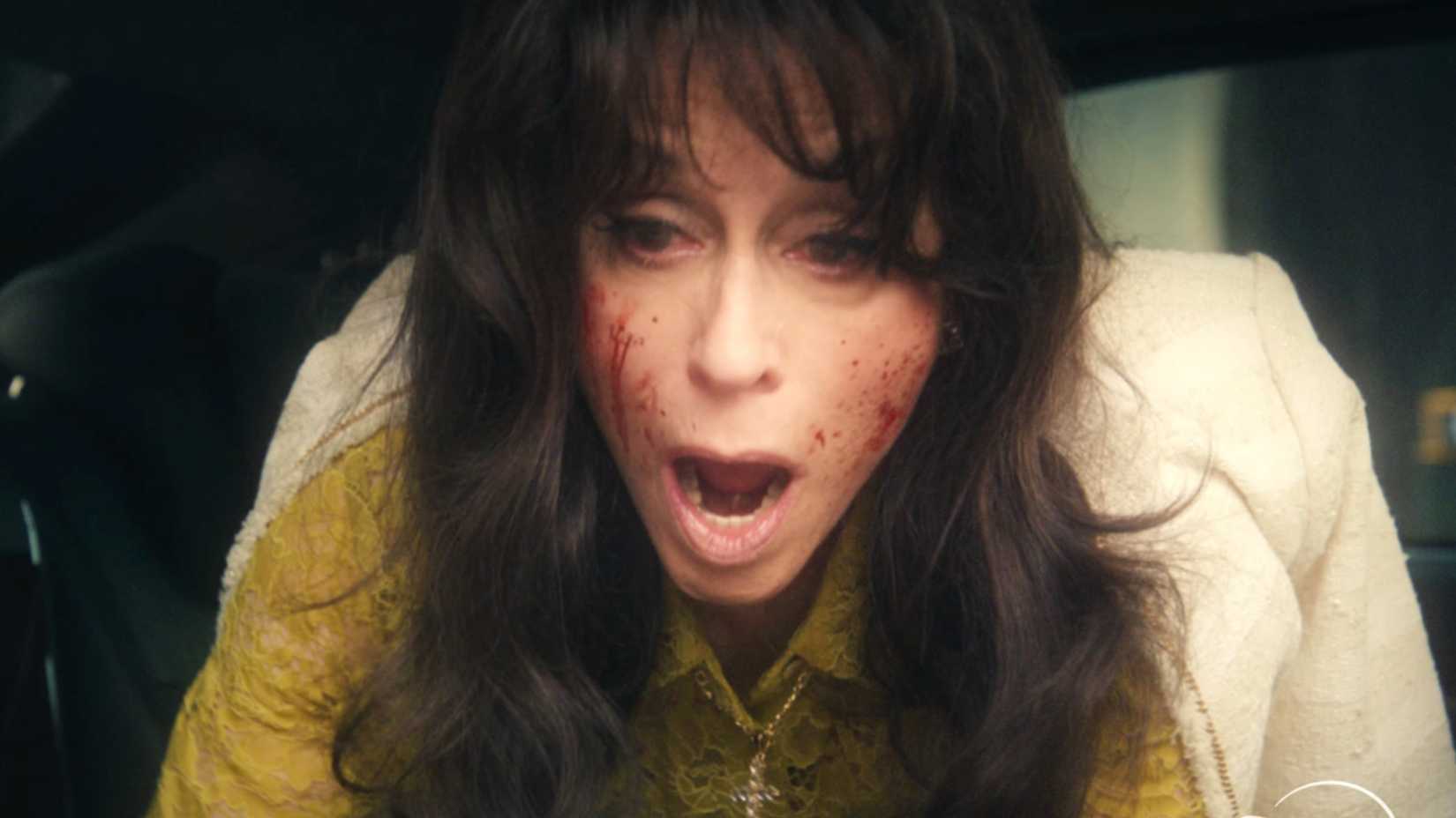 a lady with blood on her face is screaming in punisher one last kill