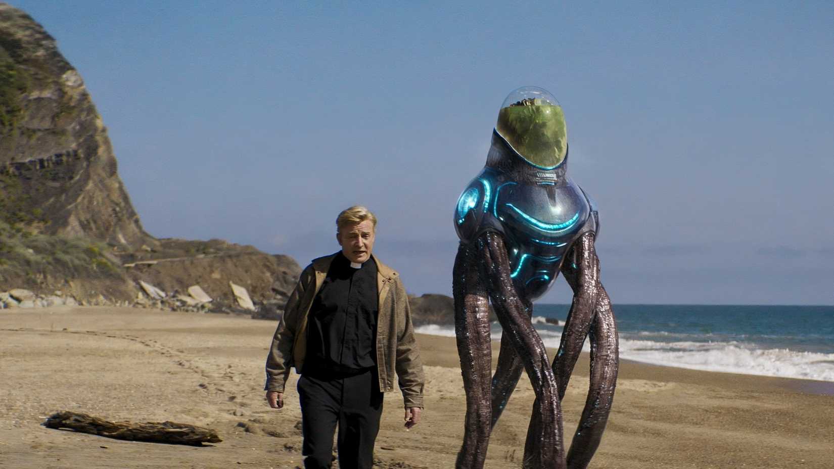 A priest and an alien walk on the beach in Love Death and Robots