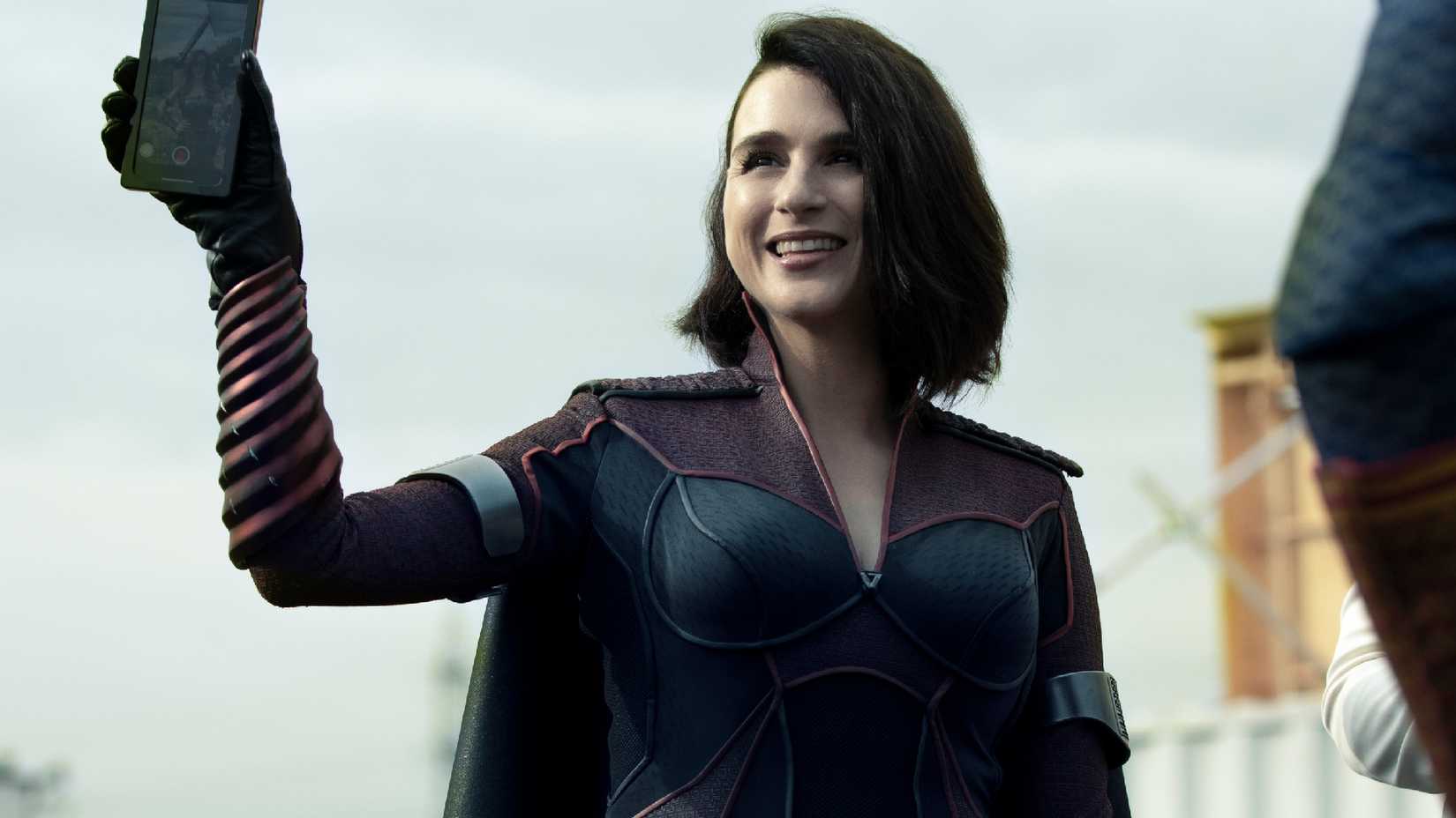 aya cash as stormfront holding a phone in the boys