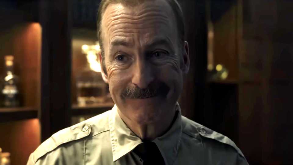 Bob Odenkirk's Ulysses smiling politely in Normal