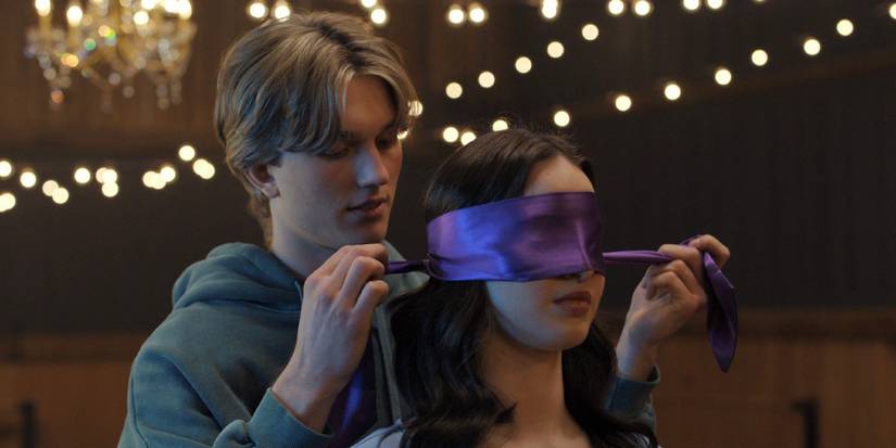 brayden tying a blindfold for adriana in in finding her edge season 1