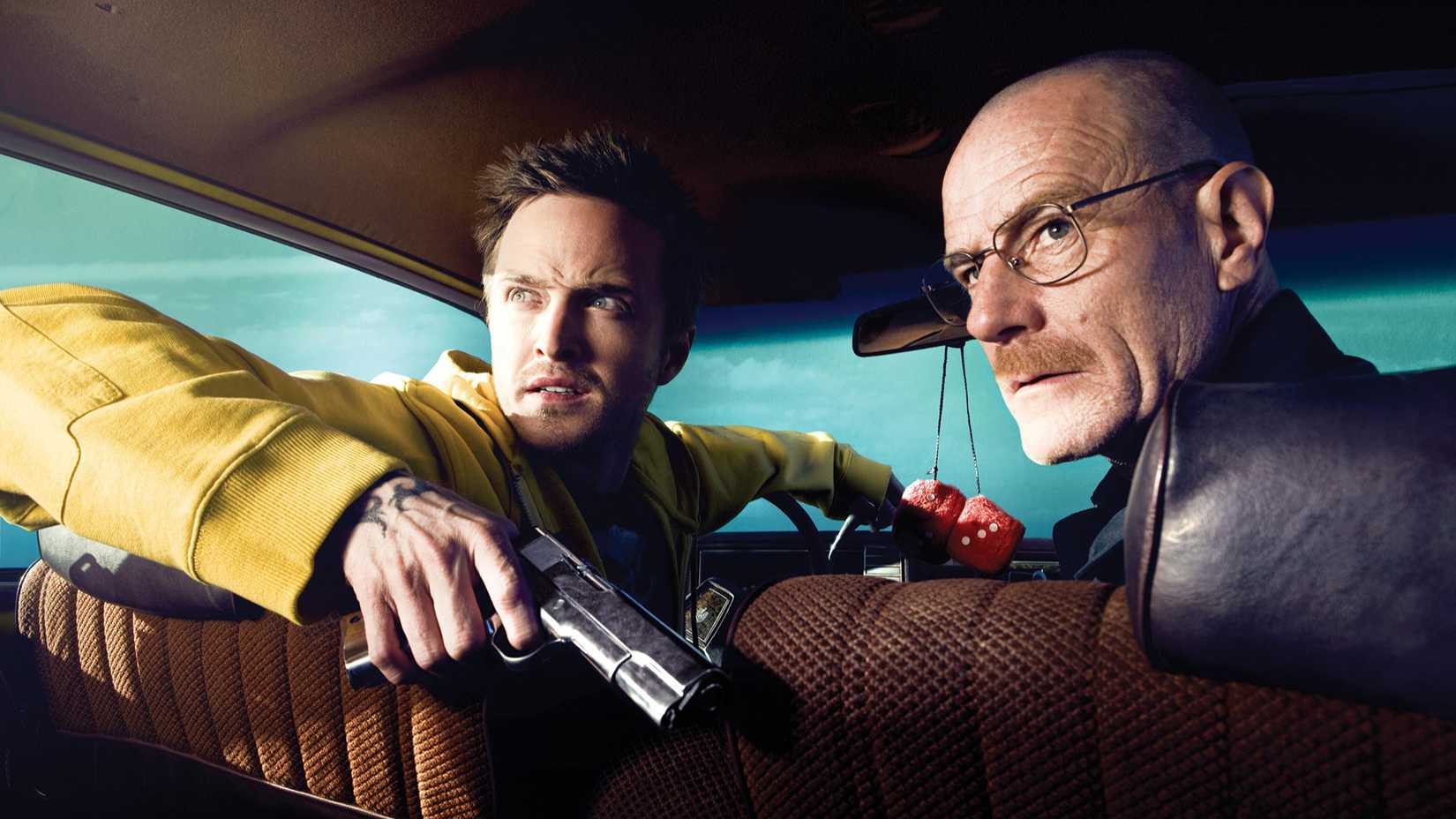 Walter and Jesse sitting in a car with a gun in Breaking Bad