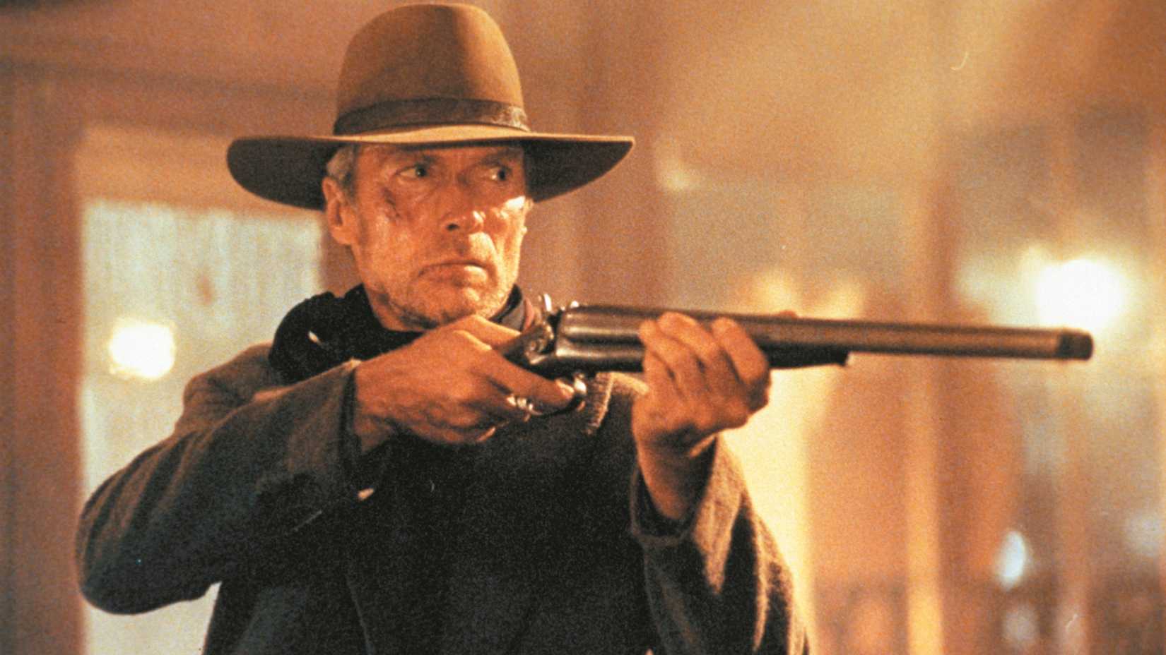 Clint Eastwood holding a rifle in Unforgiven