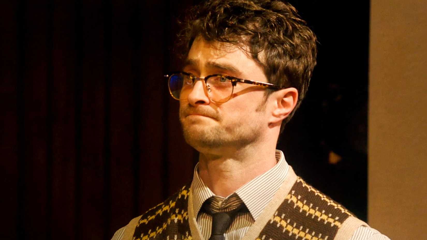 Daniel Radcliffe looks to the side in the Merrily We Roll Along proshot