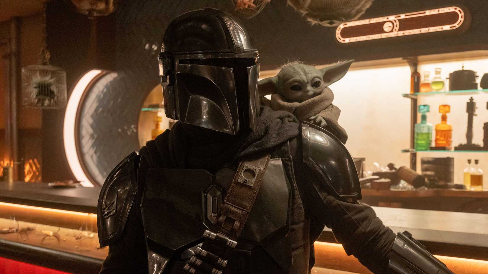 Din Djarin e Grogu em cena de The Mandalorian and Grogu