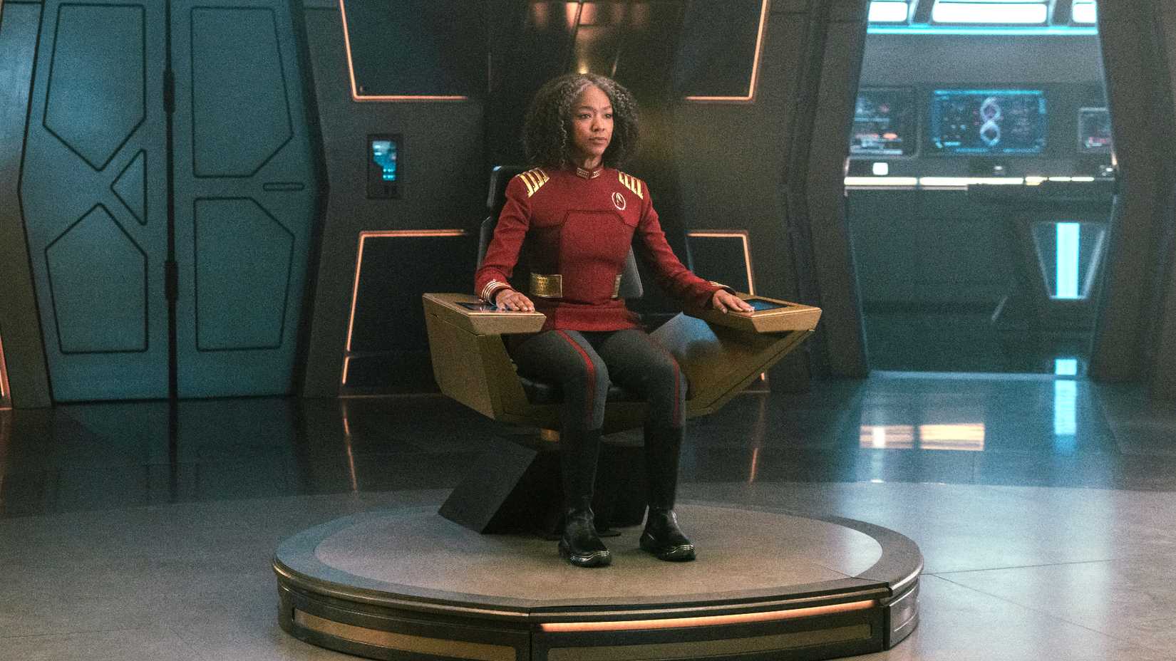 Admiral Burnham in captain's chair