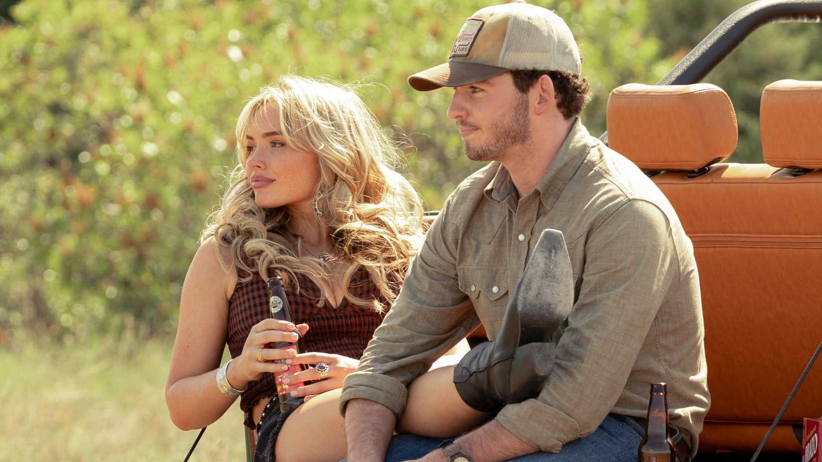 Natalie Alyn Lind as Oreana and Finn Little as Carter in Dutton Ranch (2026)