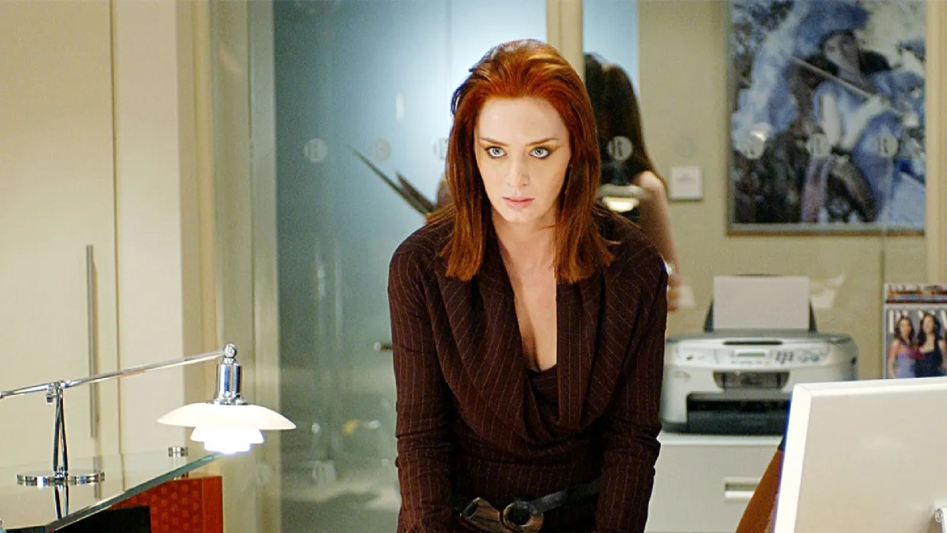 Emily Blunt como Emily em O Diabo Veste Prada