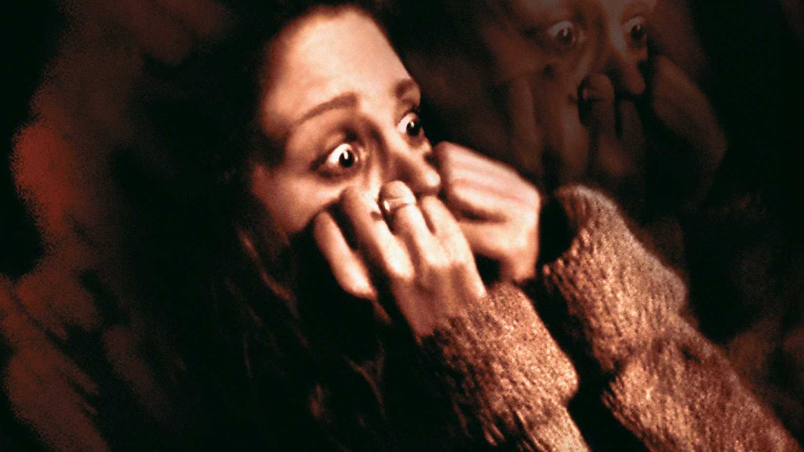 10 Horror TV Shows & Movies To Watch After Something Very Bad Is Going To Happen 3 He Knows You're Alone poster shows a woman terrified